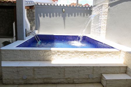 Casa de condomínio à venda com 280m², 4 quartos e 2 vagasPiscina