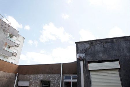 Studio - Sala / Quarto Vista de kitnet/studio à venda com 1 quarto, 33m² em Centro Histórico, Porto Alegre