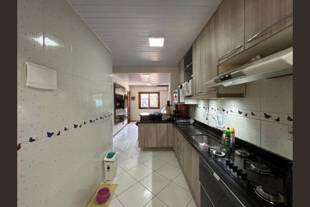 Casa à venda com 59m², 2 quartos e 2 vagas Casa à venda com 59m², 2 quartos e 2 vagasCozinha