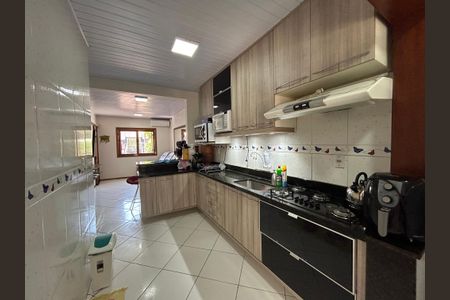 Casa à venda com 59m², 2 quartos e 2 vagas Casa à venda com 59m², 2 quartos e 2 vagasCozinha