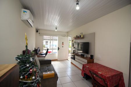 Sala de casa de condomínio à venda com 2 quartos, 55m² em Hípica, Porto Alegre