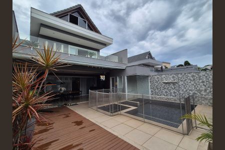 Casa de condomínio à venda com 400m², 4 quartos e 2 vagas Casa de condomínio à venda com 400m², 4 quartos e 2 vagasÁrea externa