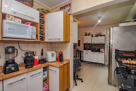 Casa de condomínio à venda com 97m², 2 quartos e 2 vagas Casa de condomínio à venda com 97m², 2 quartos e 2 vagasCozinha e Área de Serviço