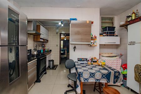 Casa de condomínio à venda com 97m², 2 quartos e 2 vagas Casa de condomínio à venda com 97m², 2 quartos e 2 vagasCozinha e Área de Serviço