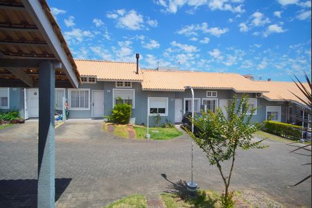 Sala - Vista de casa de condomínio à venda com 2 quartos, 63m² em Petrópolis, Porto Alegre