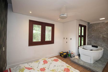 Casa de condomínio para alugar com 538m², 4 quartos e 5 vagasSuíte 