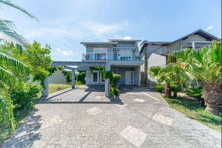 Casa de condomínio para alugar com 275m², 4 quartos e 2 vagasFachada