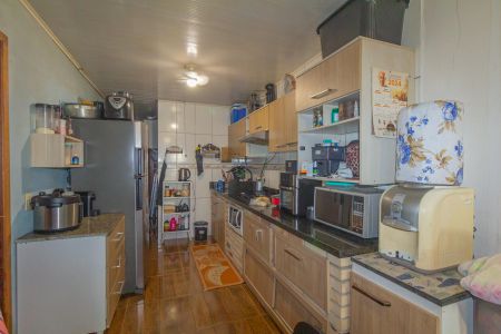 Casa à venda com 150m², 3 quartos e 2 vagas Casa à venda com 150m², 3 quartos e 2 vagasSala/Cozinha