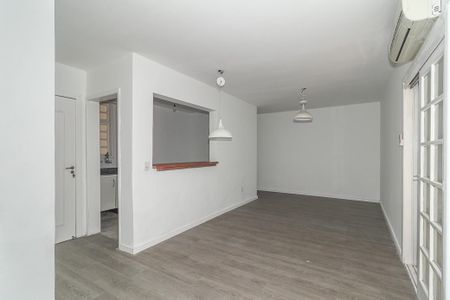 Sala de apartamento à venda com 1 quarto, 72m² em Auxiliadora, Porto Alegre