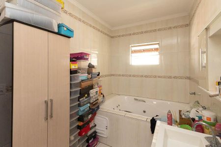 Casa à venda com 310m², 5 quartos e 3 vagas Casa à venda com 310m², 5 quartos e 3 vagasBanheiro da Suíte 1