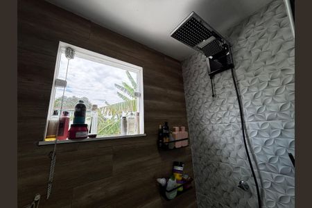 Casa de condomínio à venda com 245m², 2 quartos e 3 vagasBanheiro da Suíte 1