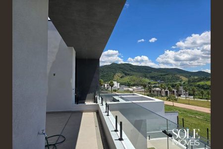 Casa de condomínio à venda com 328m², 4 quartos e 4 vagas