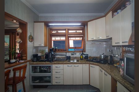 Casa à venda com 135m², 3 quartos e 2 vagas Casa à venda com 135m², 3 quartos e 2 vagasCozinha