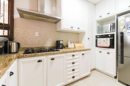 Casa à venda com 138m², 3 quartos e 3 vagas Casa à venda com 138m², 3 quartos e 3 vagasCozinha