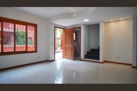 Sala  de casa de condomínio para alugar com 4 quartos, 217m² em Vila Jardim, Porto Alegre