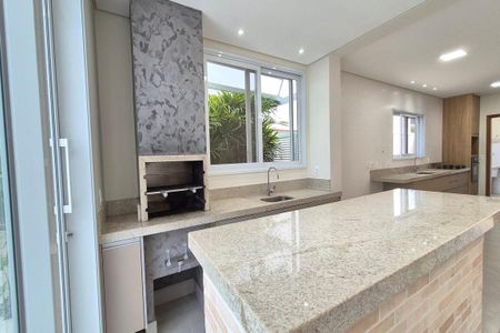 Casa de condomínio à venda com 216m², 4 quartos e 4 vagasÁrea comum - Churrasqueira