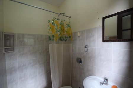 Casa de condomínio à venda com 350m², 4 quartos e 4 vagasBanheiro de Serviço