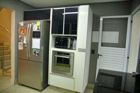 Casa de condomínio para alugar com 250m², 4 quartos e 4 vagasCozinha 