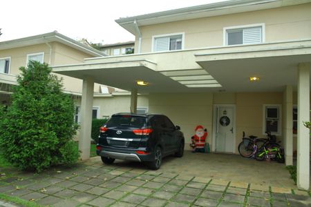 Casa de condomínio para alugar com 250m², 4 quartos e 4 vagasGaragem/Fachada