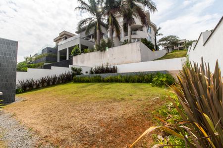 Casa de condomínio para alugar com 370m², 4 quartos e 6 vagasQuintal