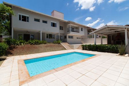 Casa de condomínio à venda com 590m², 4 quartos e 8 vagasÁREA EXTERNA PISCINA FUNDOS