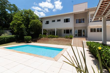 Casa de condomínio à venda com 590m², 4 quartos e 8 vagasÁREA EXTERNA PISCINA FUNDOS