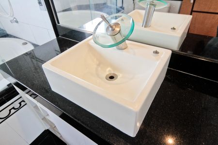 Apartamento à venda com 64m², 1 quarto e 2 vagas Apartamento à venda com 64m², 1 quarto e 2 vagasBanheiro da Suíte