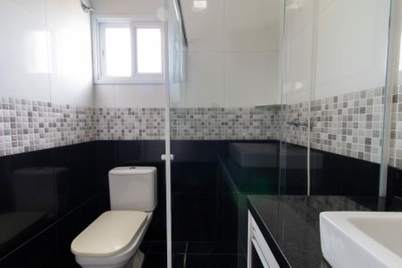 Casa de condomínio para alugar com 258m², 3 quartos e 4 vagasBanheiro da Suíte 2