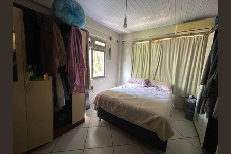 Casa à venda com 55m², 4 quartos e 2 vagasQuarto 3