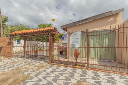 Fachada de casa à venda com 3 quartos, 150m² em Fátima, Canoas