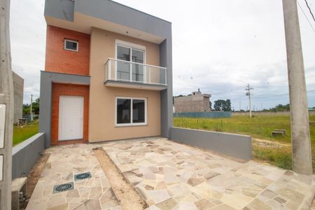 Casa à venda com 112m², 3 quartos e 2 vagasGaragem/Fachada