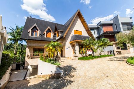 Casa de condomínio para alugar com 680m², 5 quartos e 8 vagasVista da Rua