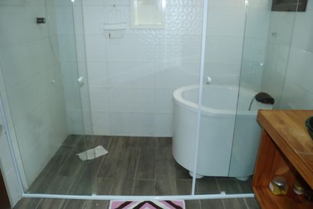 Casa de condomínio para alugar com 2600m², 3 quartos e sem vagaBanheiro da Suíte