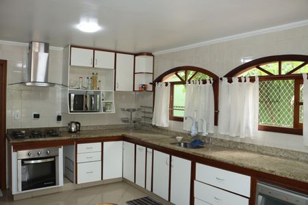 Casa de condomínio para alugar com 2600m², 3 quartos e sem vagaCozinha