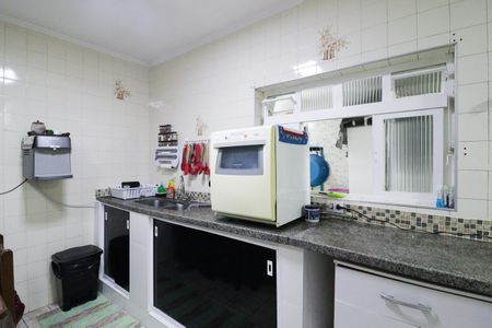 Casa à venda com 260m², 4 quartos e 5 vagas Casa à venda com 260m², 4 quartos e 5 vagasCozinha e Área de Serviço