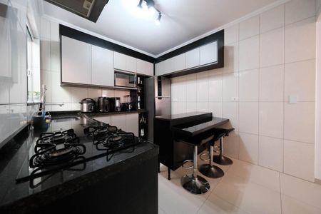 Casa de condomínio à venda com 74m², 2 quartos e 2 vagasCozinha e Área de Serviço