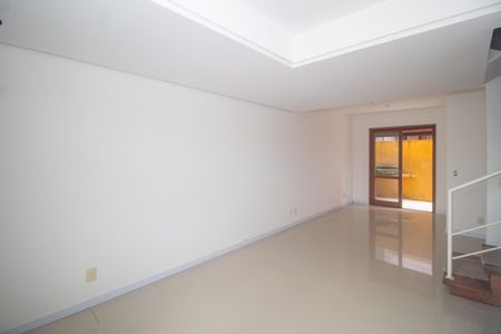 Sala de casa de condomínio à venda com 3 quartos, 99m² em Espírito Santo, Porto Alegre