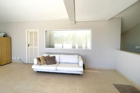 Casa de condomínio para alugar com 512m², 4 quartos e 6 vagasSala de estar cobertura