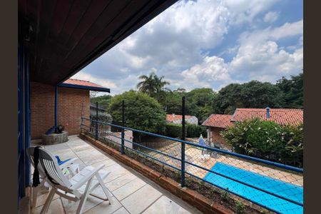 Casa de condomínio para alugar com 400m², 4 quartos e 5 vagasVaranda da casa de hóspedes