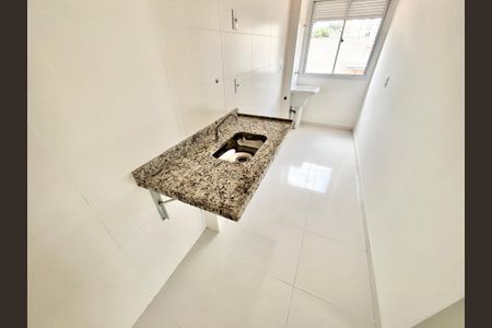 Apartamento à venda com 48m², 2 quartos e sem vaga Apartamento à venda com 48m², 2 quartos e sem vagaCozinha e Área de Serviço