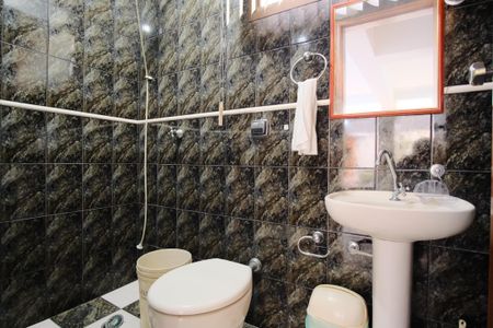 Casa para alugar com 310m², 4 quartos e 6 vagasBanheiro de Serviço