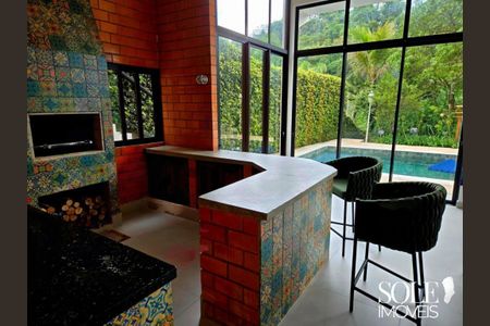 Casa de condomínio à venda com 413m², 4 quartos e 3 vagas