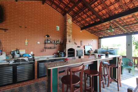 Casa de condomínio para alugar com 1500m², 4 quartos e 3 vagasFundos da casa - Churrasqueira