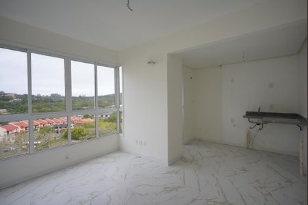 Sala e cozinha de apartamento à venda com 3 quartos, 53m² em Cavalhada, Porto Alegre