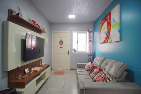 Sala de casa de condomínio à venda com 2 quartos, 48m² em Feitoria, São Leopoldo