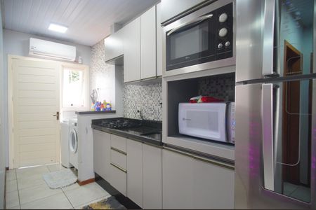 Casa de condomínio à venda com 48m², 2 quartos e 2 vagasCozinha