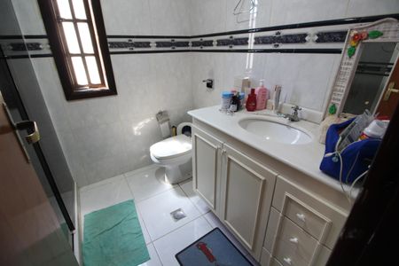 Casa de condomínio à venda com 250m², 4 quartos e 3 vagasBanheiro Social 1