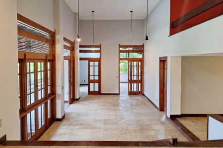 Casa de condomínio para alugar com 400m², 4 quartos e 4 vagasSala 1