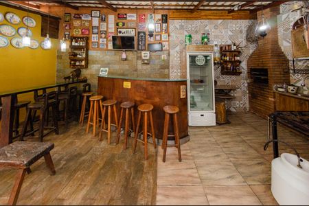 Casa à venda com 560m², 4 quartos e 3 vagasÁrea churrasqueira