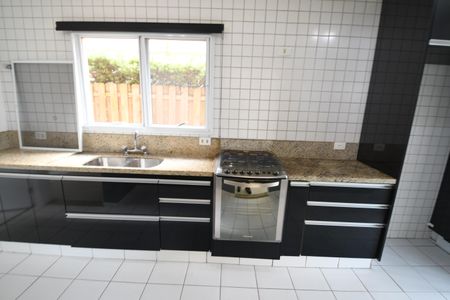 Casa de condomínio para alugar com 220m², 3 quartos e 4 vagasCozinha